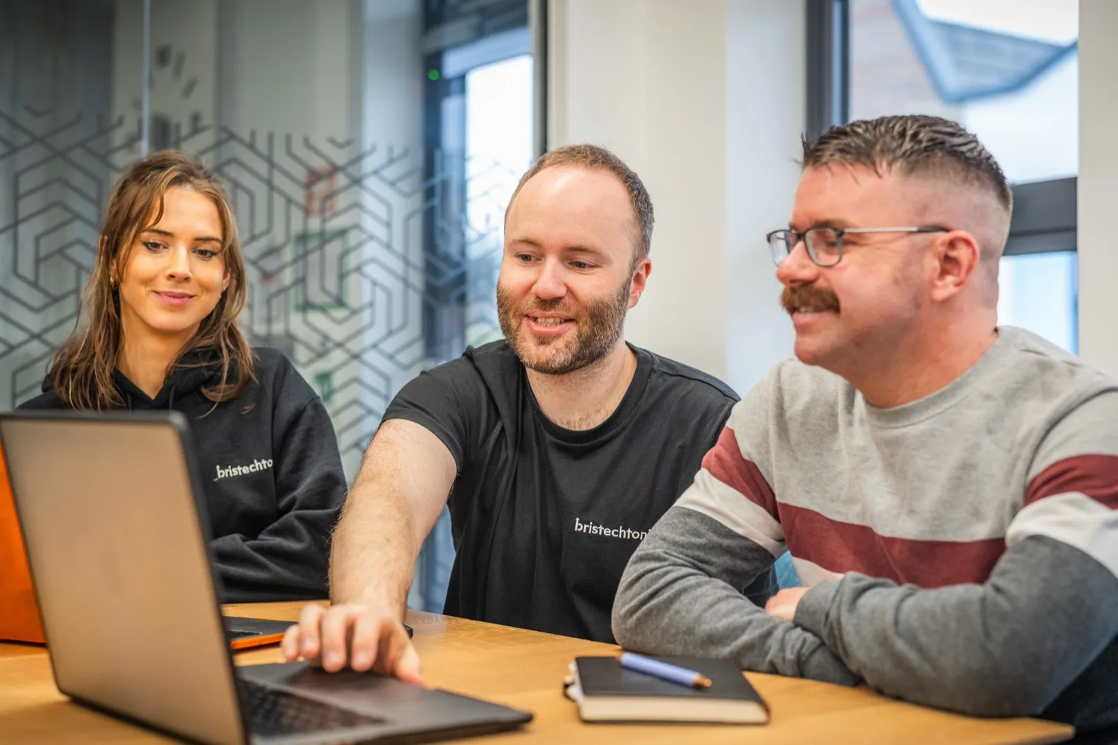BrisTechTonic team members collaborating on a client's search plan