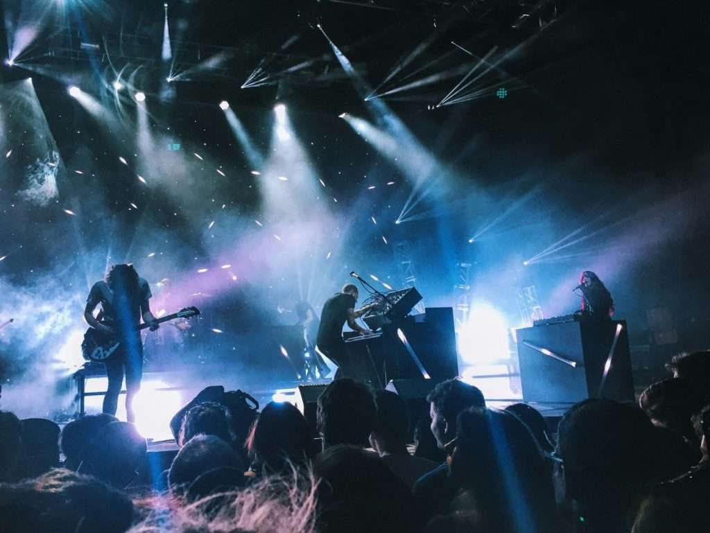 Live wedding band performing on stage at a concert