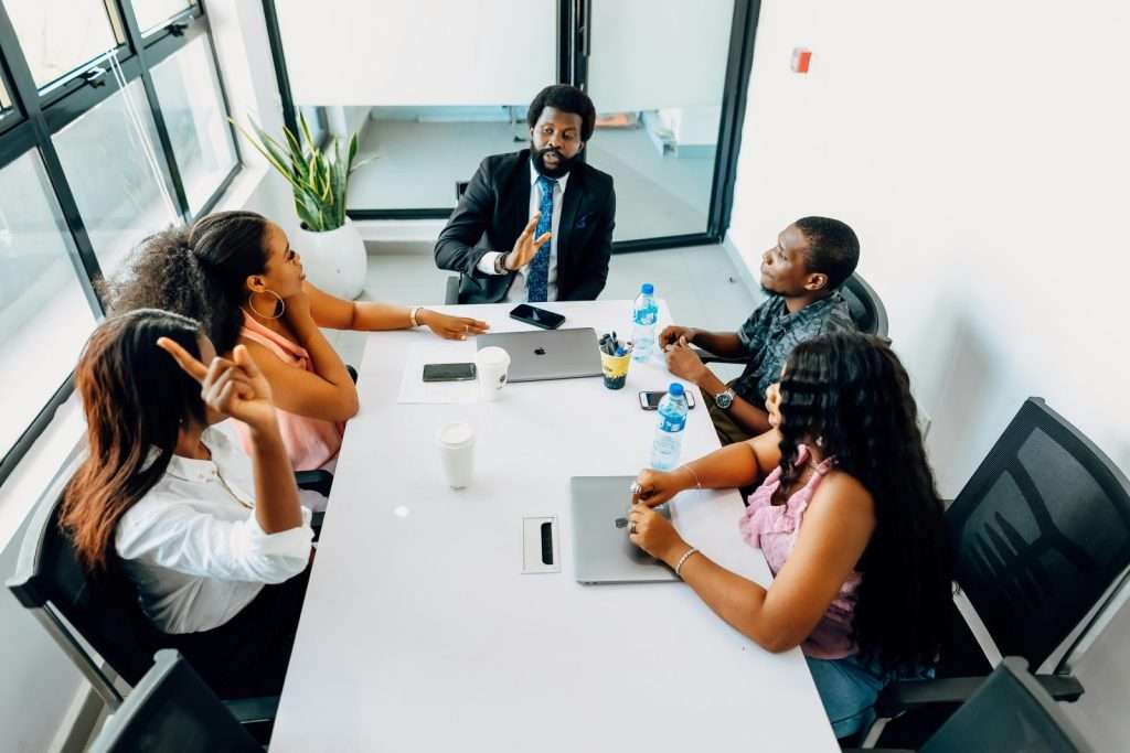 Team meeting discussing SEO agency