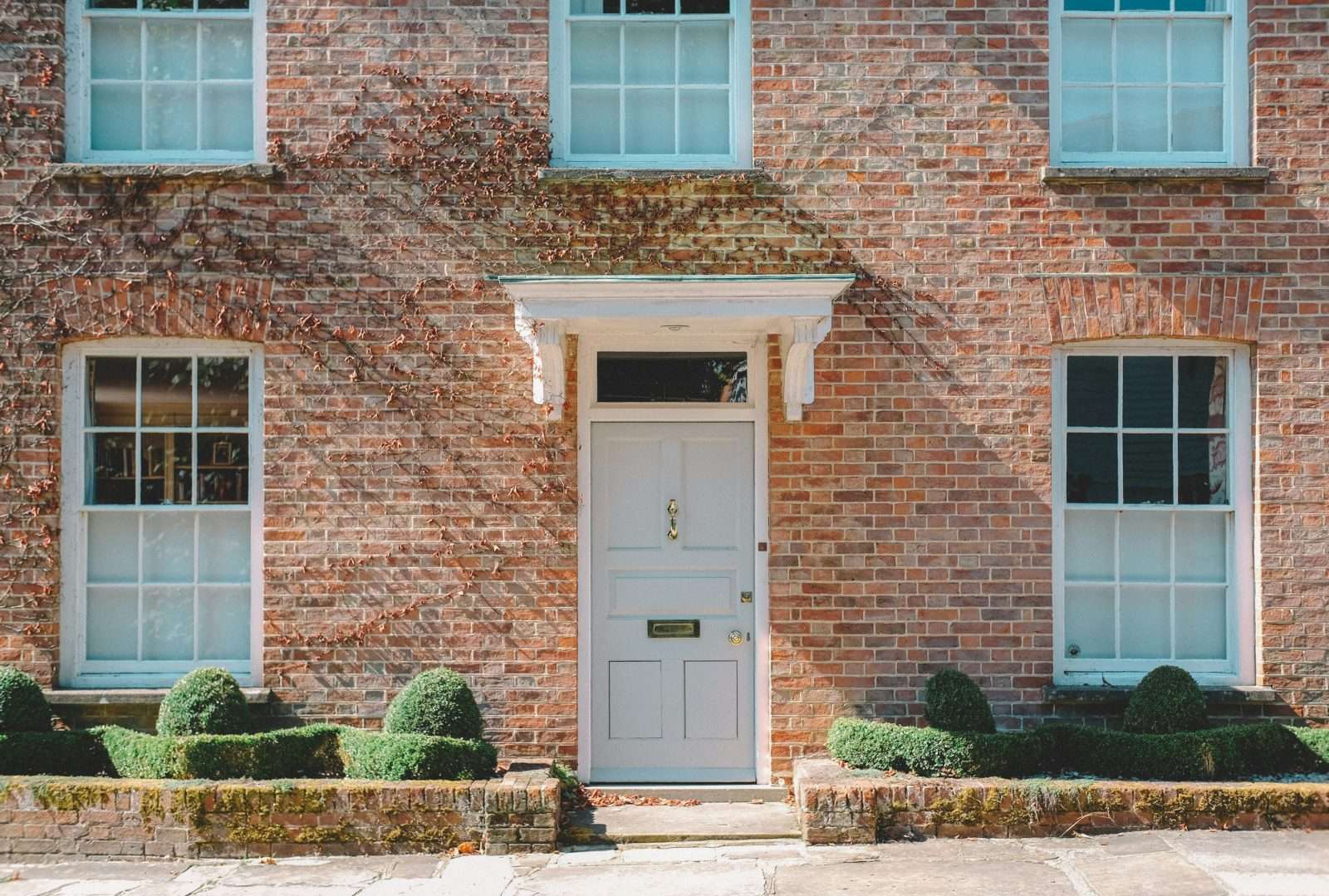 UK estate agent brick property with white door