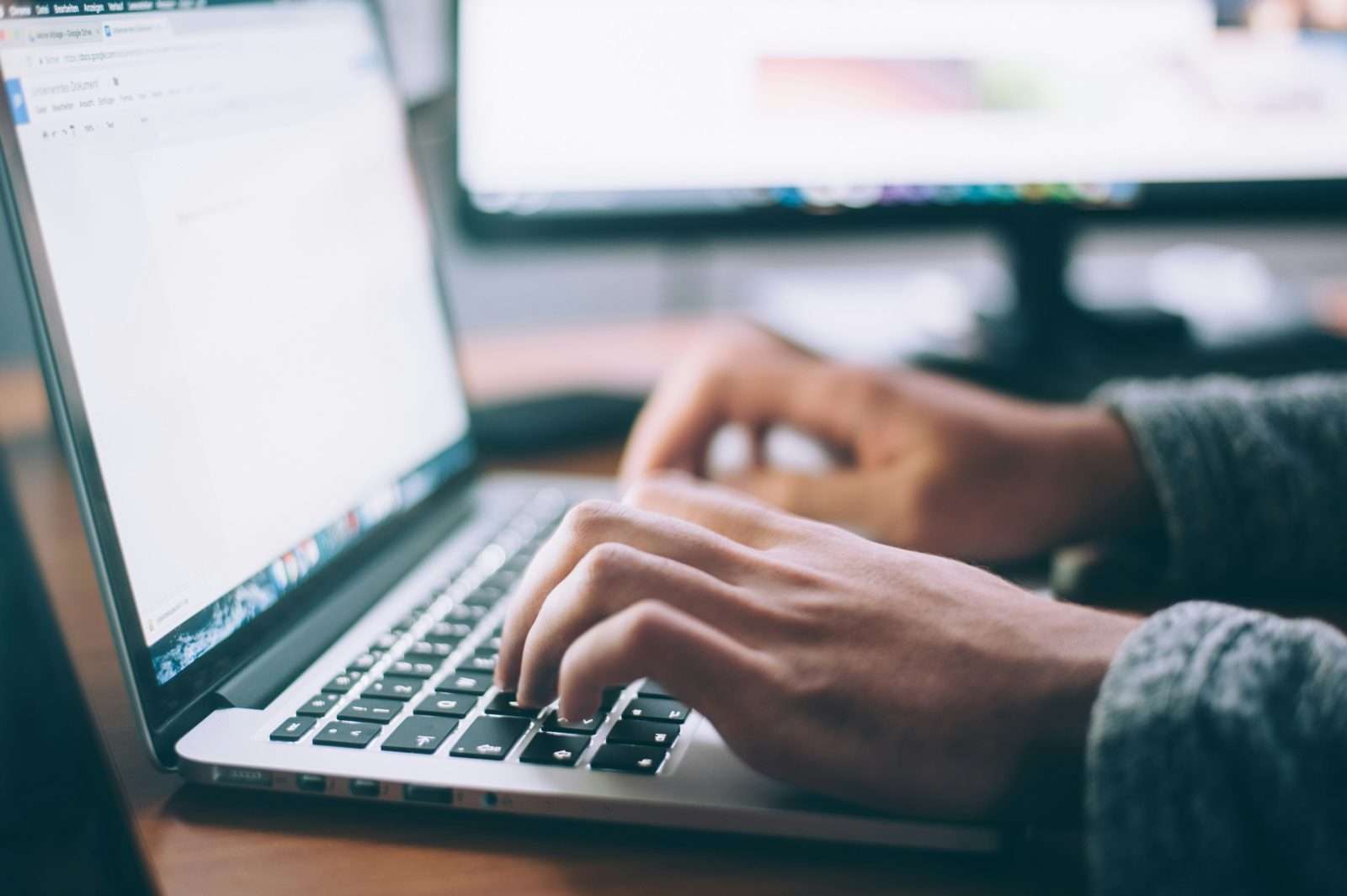 Web designer working on laptop